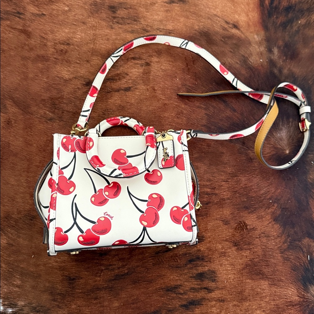 Coach Cherry rogue mini 17 excellent condition